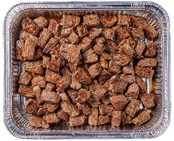 A rectangular aluminum tray filled with small, diced pieces of cooked beef, seasoned and browned. The meat is arranged closely together, showcasing a rich, golden-brown color.